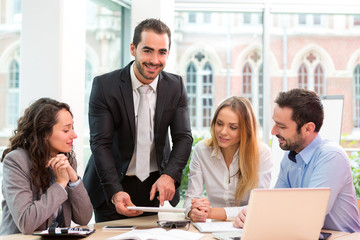 Group of business people working together at the office