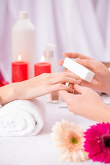 Professional manicurist  making manicure 