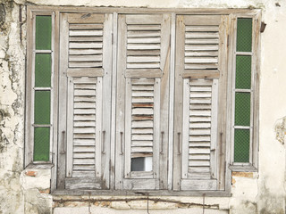 old brick wall and old wooden window in thailand