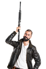 Pimp man holding a rifle