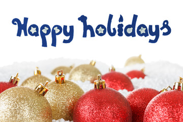Christmas ball baubles, gold and red colors, decoration on the snow