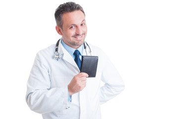 Happy smiling young doctor or medic holding wallet