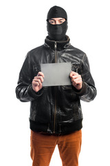 Robber holding an empty placard