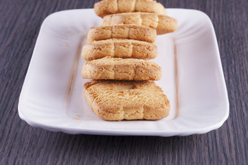 Biscuits over white plate