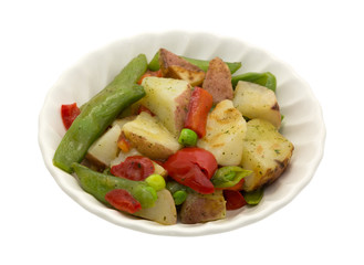 Healthy vegetables with garlic sauce in a small bowl