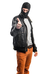 Robber with thumb up