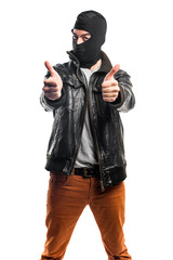Robber with thumb up
