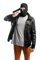 Robber shooting with a pistol