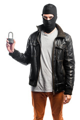 Robber holding vintage padlock