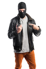 Robber holding vintage padlock