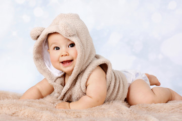 Happy little baby crawling in diaper