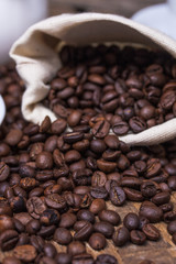 Coffee cup and coffee beans on table