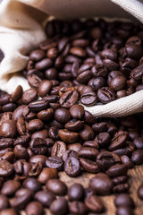 Coffee cup and coffee beans on table