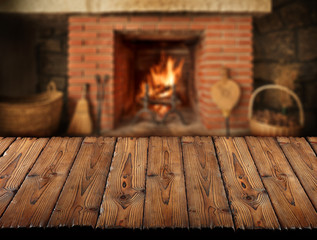 table in front of fireplace