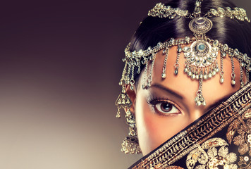 Beautiful Indian women portrait with jewelry. elegant Indian girl , bollywood style .  Indian jewelry with  dark skin model . Beautiful brunette asian girl with black veil on face  - 96311460