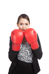 Young Asian business woman with red boxing gloves