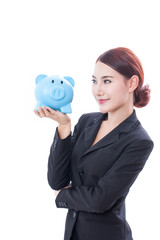 Portrait of business woman holding piggy bank on white background