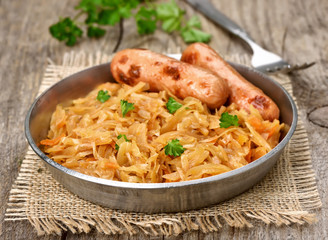 Stew cabbage with sausage