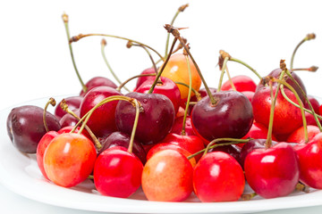 Large cherry on a white plate