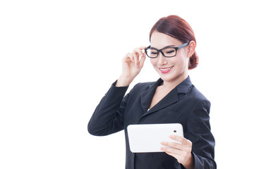 Portrait of young businesswoman wearing glasses using tablet on white background