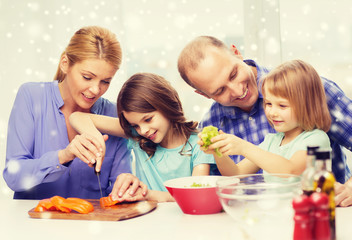 happy family with two kids making dinner at home
