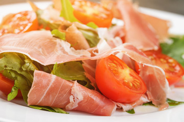 salad with jamon and cherry tomatoes