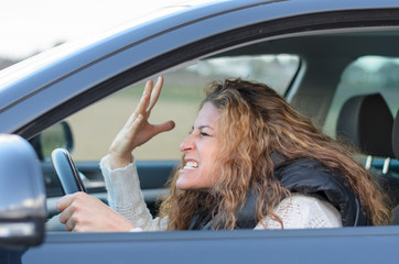 woman is driving her car