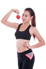 Fitness woman holding apple.