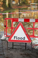 Warning Sign On Flooded Road