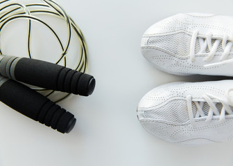 close up of sneakers and skipping rope