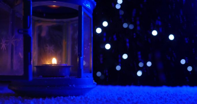 christmas lantern with snowfall