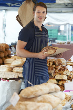 Owner Of Breadstall At Outdoor Market