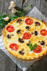 Pie with chicken, mushrooms and egg filling
