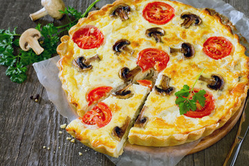 Quiche Lorraine pie with chicken and mushrooms