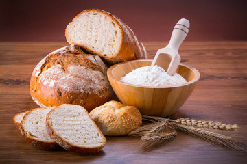 Freshly baked bread on wooden table