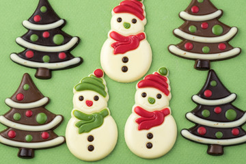 Assorted chocolate snowmen, candy trees.