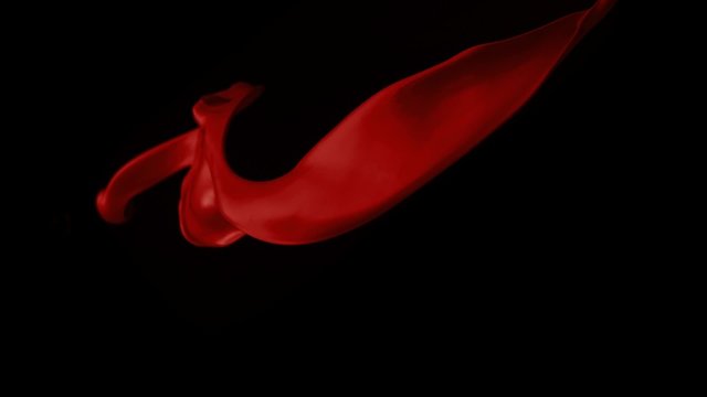 Red paint splash in the air shooting with high speed camera, phantom flex.