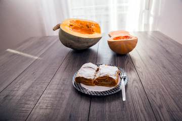 Pumpkin pie on a wooden table