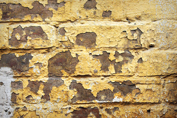 Grunge vintage yellow wall - background
