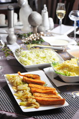 Fototapeta na wymiar Baked salmon with florence fennel and salad on Festive/Christmas table