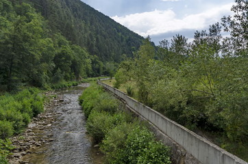 View toward river, rest-house and highly varied plant, Chepinska reka, Velingrad, Pazardzhik  province, Bulgaria