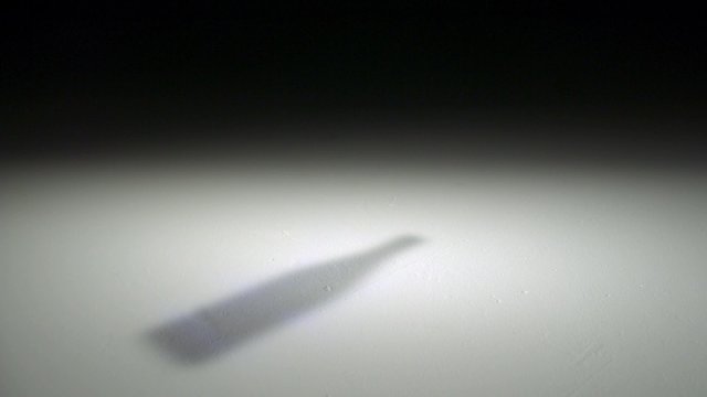 Dropping and smashing glass bottle shooting with high speed camera, phantom flex.