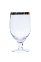 Empty crystal wine glass on a white background