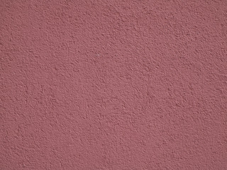 verputzte Wand in Rosa