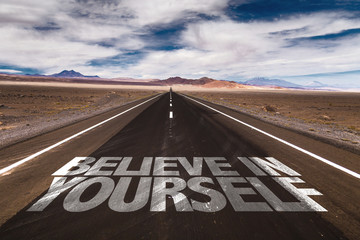 Believe in Yourself written on desert road