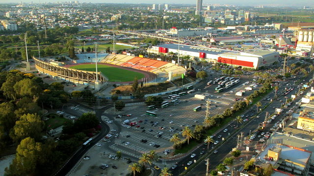 Aerial view of cityscape of Ramat Gan and Tel aviv. Places like Ramat Gan Stadium, Hayarkon Park, Ayalon Mall, Industrial Zone of Bnei Brak, Ramat Hahayal neighborhood of Tel Aviv.
