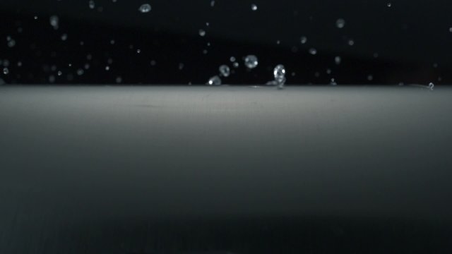 Water fall on steel sheet shooting with high speed camera, phantom flex.