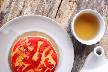 Chinese cake with hot tea