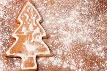 Christmas tree gingerbread cookie with white frosting