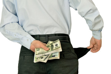 men businessman showing empty pockets hiding behind wads of money